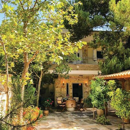 Amazing Home In Artemida With Kitchen Bagian luar foto
